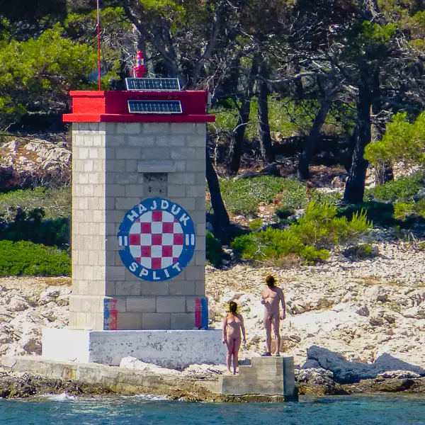 Naturists Naturists promote their lifestyle to a crusie ship's passengers in Rab, Croatia.